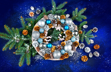 Christmas wreath on a dark blue background