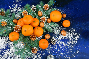 tangerines on a blue Christmas background