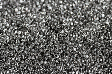 Black and white abstract bubbles background. Homogeneous texture of dark bubbles in syntethic pores