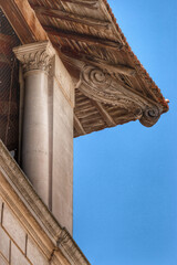 Intricate wooden structure, detail of roof eaves in Arles, France. A typical detail of the roof of a Provencal building.