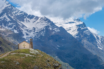 Chapel church above Idyllic Dolomites Alpine landscape, Gran Paradiso, Italy