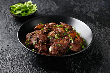 Fried chicken liver, poultry meat food with herbs