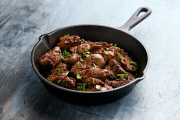 Fried chicken liver, poultry meat food with herbs