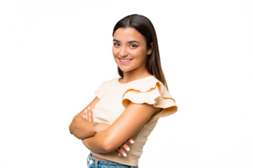 Young caucasian woman isolated on green chroma background with arms crossed and looking forward