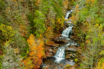 Waterfall in the autumn forest. Amazing colors of fall. Kent Falls State Park. Connecticut