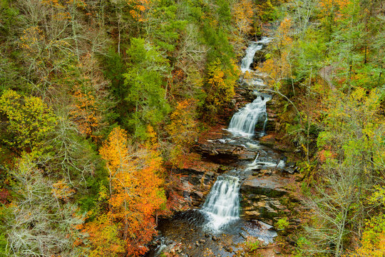 Waterfall in the autumn forest. Amazing colors of fall. Kent Falls State Park. Connecticut