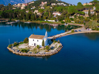 Aerial drone photo of iconic church of Ypapanti built in a small piece of land in bay of Gouvia, Corfu island, Ionian, Greece