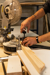 Miter saw for wood sawing a wooden board