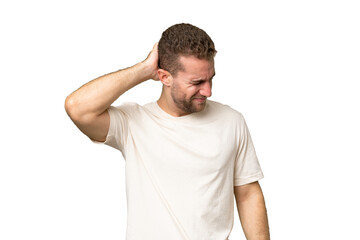 Obraz premium Young handsome caucasian man isolated on green chroma background with neckache