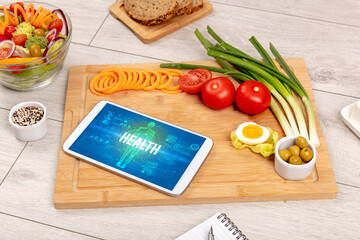 Tablet Pc with fruits, medical concept