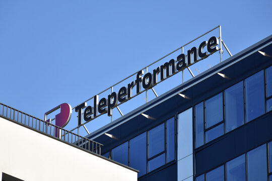 Teleperformance signage, logo, emblem on the facade of IT outsourcing company. WARSAW, POLAND - AUGUST 13, 2021