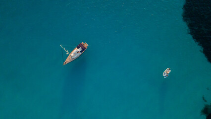 aerial imagery 4k of land and sea with boats