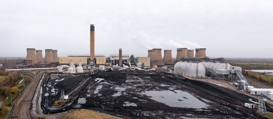 Aerial panorama of a coal fired Power Station with depleted coal stack