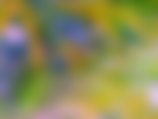 Defocused abstract background. Soft light greenish colors. Natural blur effect. Full frame of bright bokeh style tones. Ideal for designs and artistic creations.