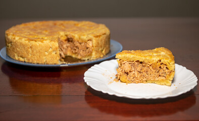 Traditional turkey pot pie isolated in selective focus and fine details.