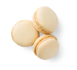 Photo sur Plexiglas Macarons group of three delicious French vanilla macaroons, sweet isolated design element, top view / flat lay