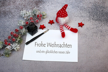 Weihnachtskarte: Karte mit Weihnachtsgrüßen Frohe Weihnachten und ein glückliches neuesJahr.