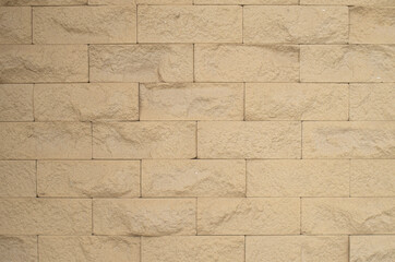 New yellow  stone wall close up