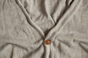 Men's gray stylish jacket with buttons as a background close-up, stylish