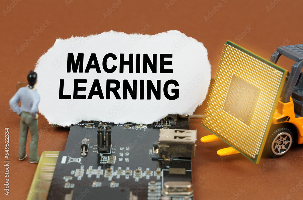Poster on the board with microcircuits lies a paper plate with the inscription - machine learning