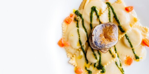 Traditional Italian food. Ravioli de branzino. Bergamo, Lombardy, Italy, Europe