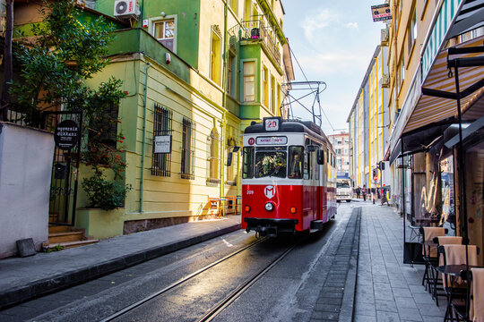 Istanbul, Turkey - October 22, 2022: Nostalgic Red Tram at Moda District. Kadikoy, Istanbul, Turkey. Kadikoy-Moda Line.