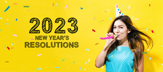 2023 New Years Resolutions with young woman with party theme on a yellow background