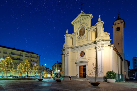 Catholic church on small town square in Alba, Italy.