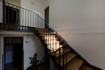 Interior wooden stairs in a vintage apartment building