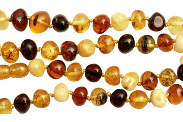 Amber beads jewelry strands isolated on transparency  photo png file