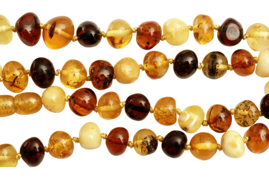 Amber beads jewelry strands isolated on transparency  photo png file