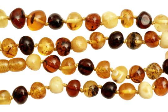Amber beads jewelry strands isolated on transparency  photo png file