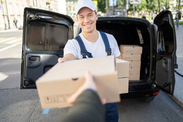 Male employee courier food delivery home. Small business service fast delivery at any time. - obrazy, fototapety, plakaty