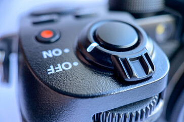 Close-up of the cameras shutter lever, iso sensitivity selection buttons, quick menu and video...