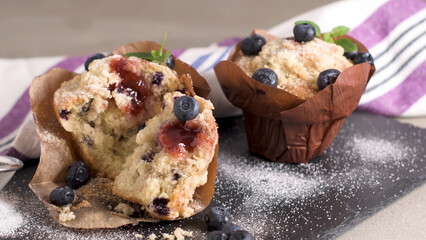 Muffins with red fruits jam fill