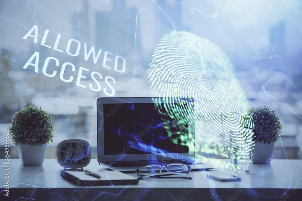 Poster Computer on desktop in office with finger print drawing. Double exposure. Concept of business data security.