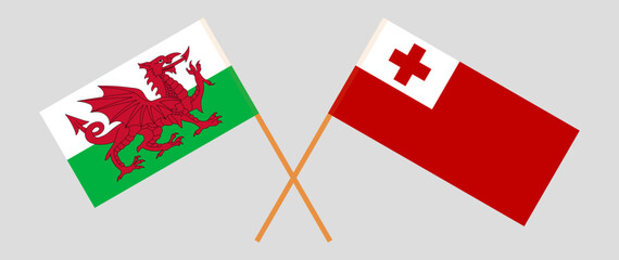 Crossed flags of Wales and Tonga. Official colors. Correct proportion