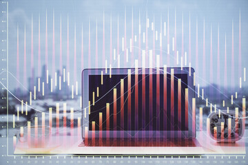 Forex Chart hologram on table with computer background. Multi exposure. Concept of financial markets.