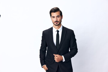 Portrait of a man in an expensive business suit on a white background isolated, copy space. Businessman startup technology