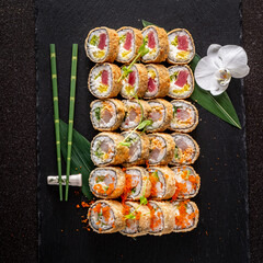 tasty sushi on the black background