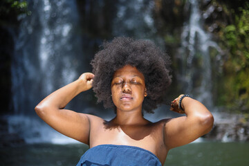 Woman touching her afro