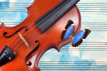 violin against the background of a music sheet in blue watercolor stains and a bright blue morpho...