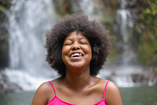 Happy Black woman with afro