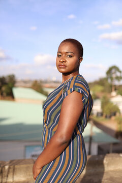 Confident Black woman with short dyed hair