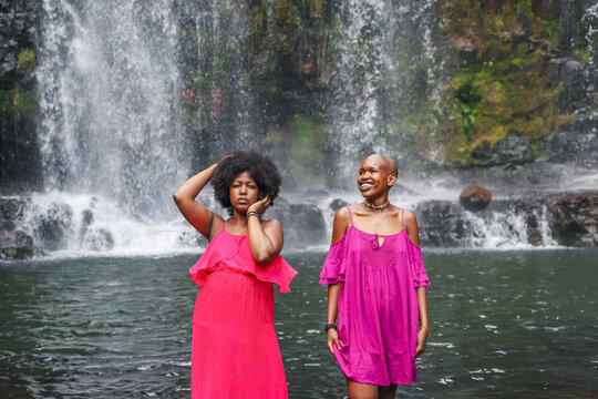 two women in a waterfall