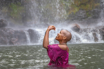 Black girl playing with water