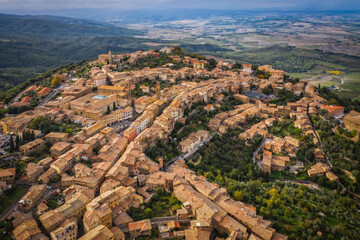 Fototapeta na wymiar Scenery of Montalchino, a beautiful medieval town in Tuscany. Italy. Aerial drone shot, october 2022