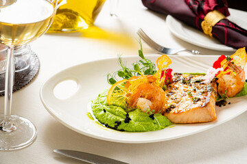 salmon steak with vegetables and sauce