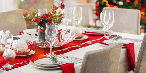 Stylish table setting for Christmas dinner at home