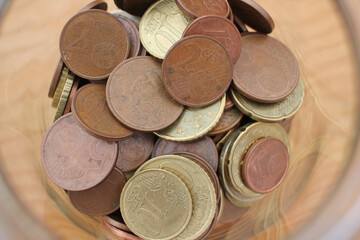 euro coins saved in a hard economy